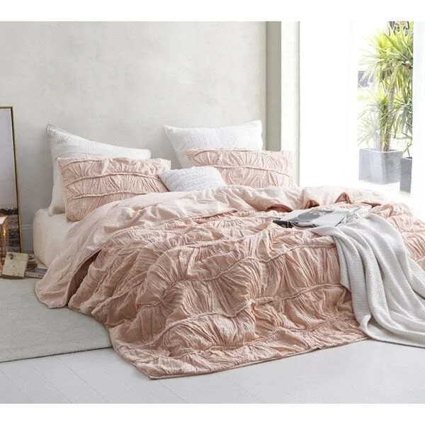 Down - filled comforters for supreme warmth and lightnessBYB Motley Texture Comforter - Peach/Pink