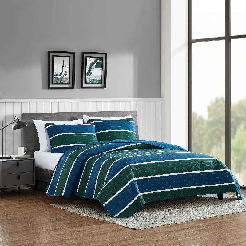 Microfiber - filled comforters that are lightweight and easy to care forNautica Knots Cove Navy Full/Queen Reversible Quilt & Sham Set