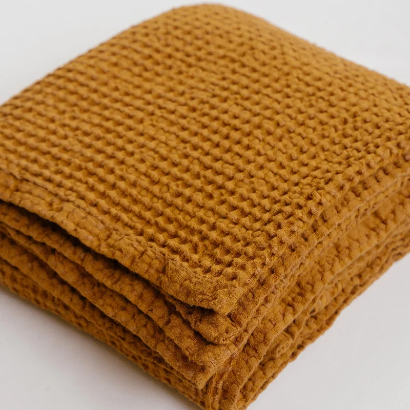 Recycled polyester blankets for an eco - conscious optionSienna Linen Waffle Blanket